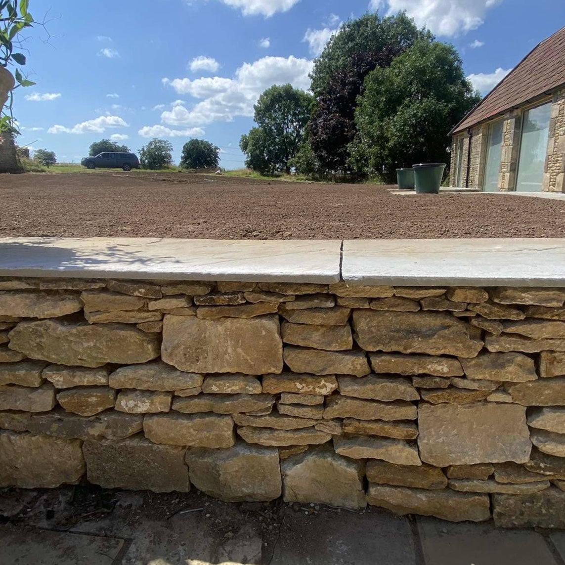 Dry stone retaining walls