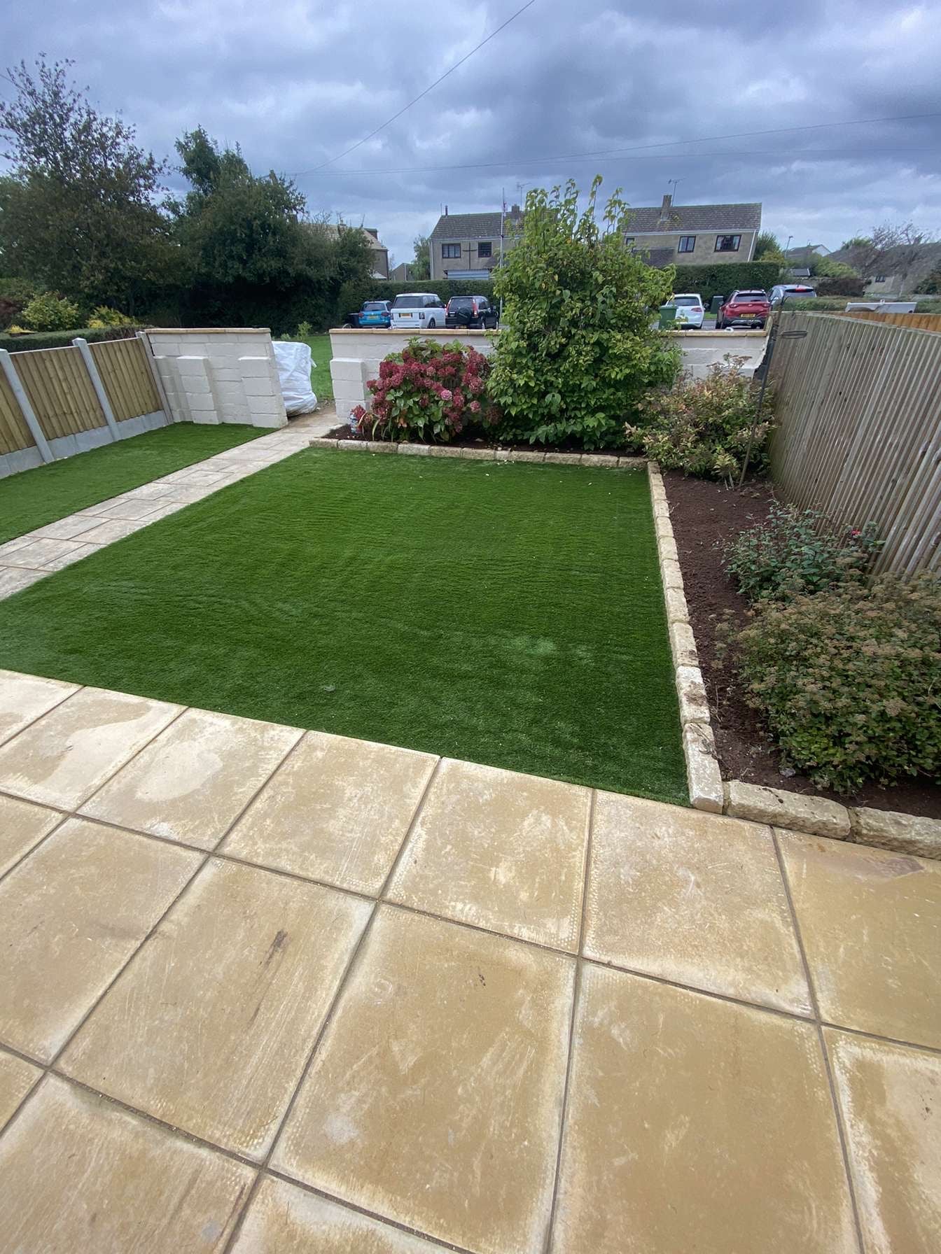 Garden renovation in Shiplake including fencing, artificial turf and patio.