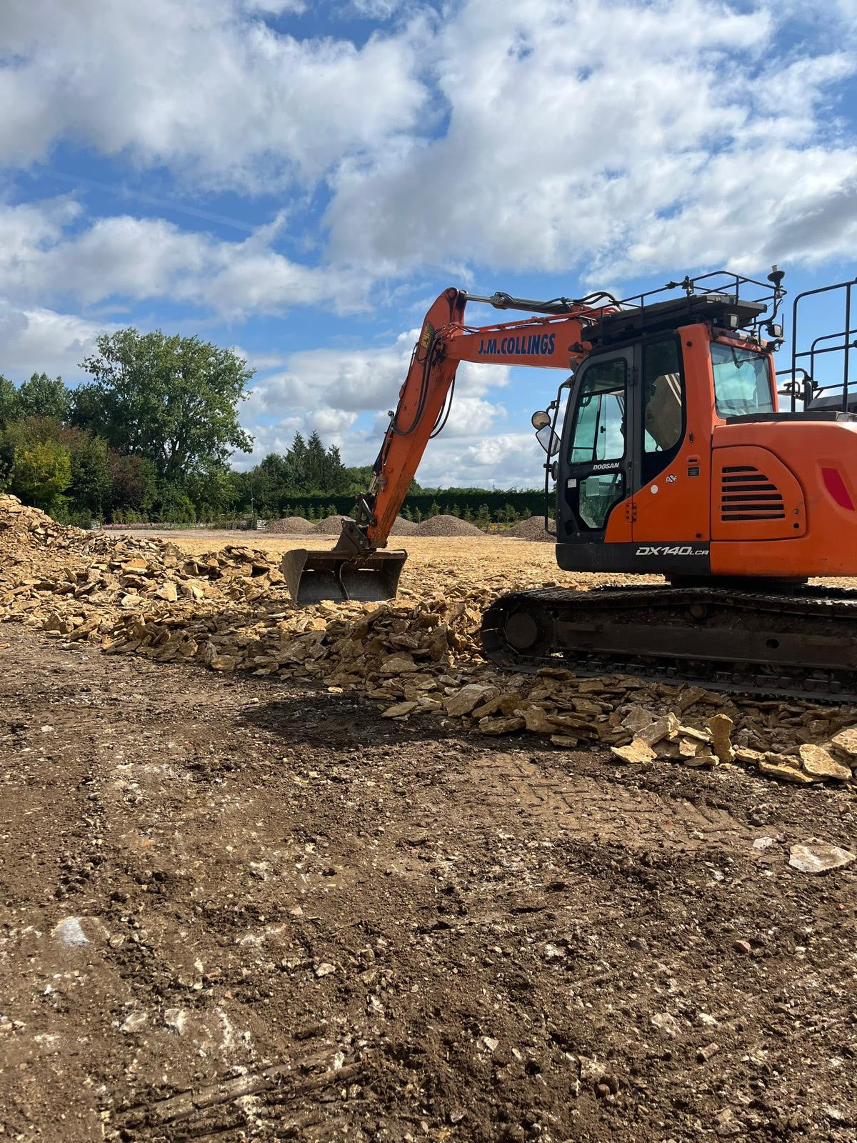 5 tonne digger working in field in Watlington.