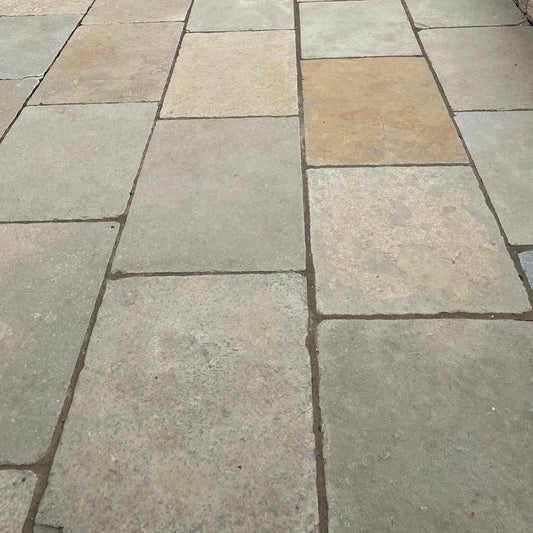 Close up image of limestone slabs on a patio in Henley-On-Thames.