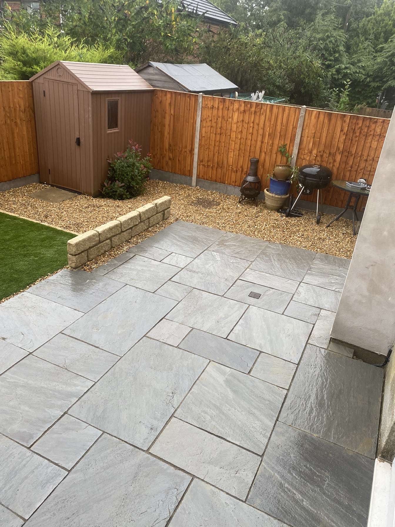 Grey sandstone patio slabs in garden renovation, Henley-On-Thames