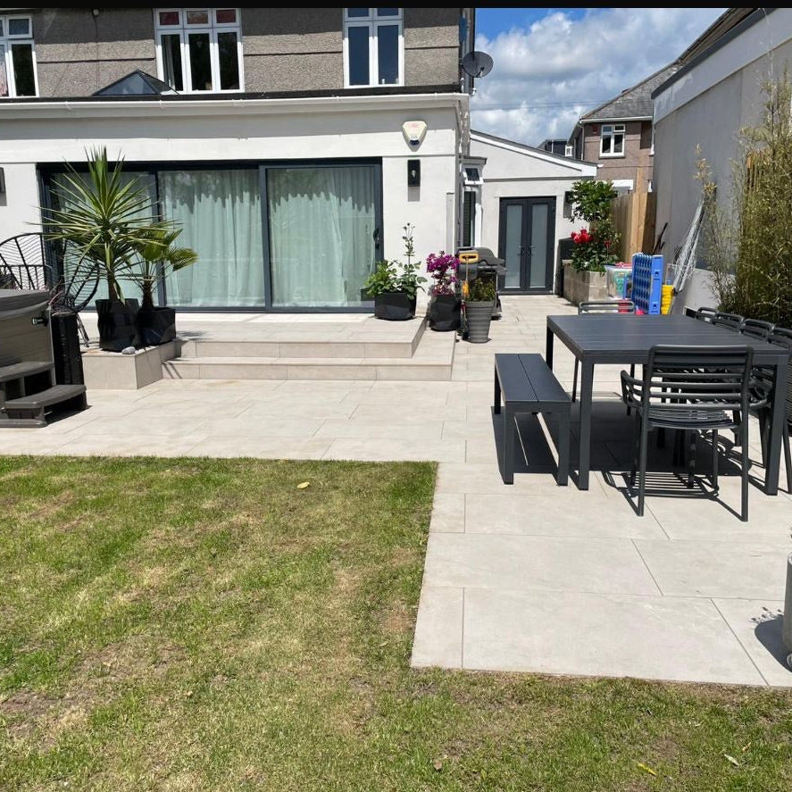 Back garden with patio area, outdoor furniture, and plants in Wargrave.