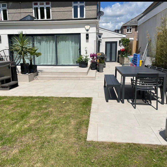Back garden with patio area, outdoor furniture, and plants in Wargrave.