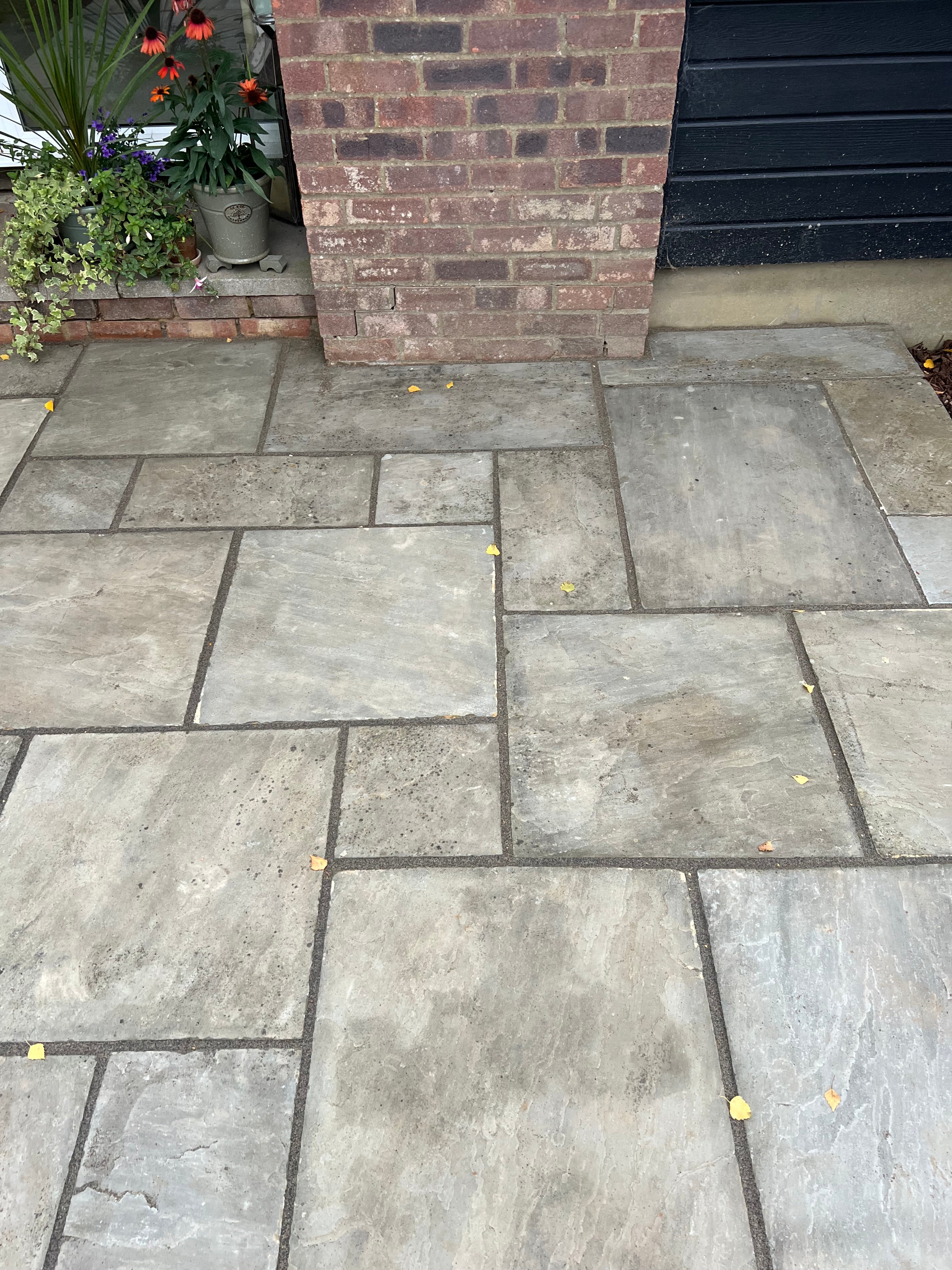 Grey sandstone slabs with matching projoint grout 